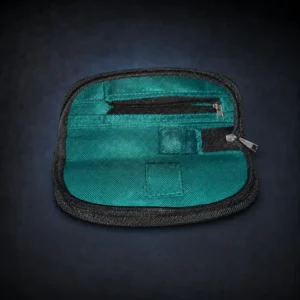 Open teal Convipen travel case with zipper pockets and elastic loops on a dark navy studio background