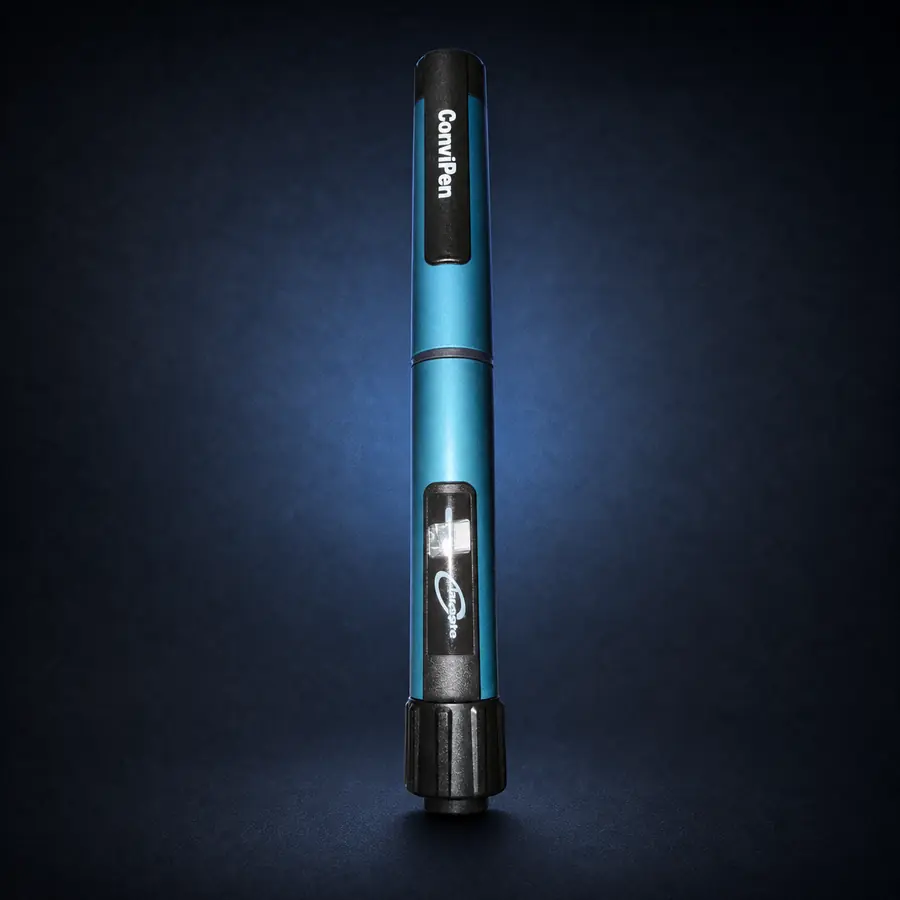 Convipen 1 Teal Convipen automatic reusable pen on a dark navy background