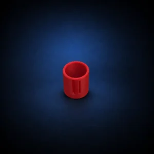 Red Niimbot label applicator on a dark navy studio background