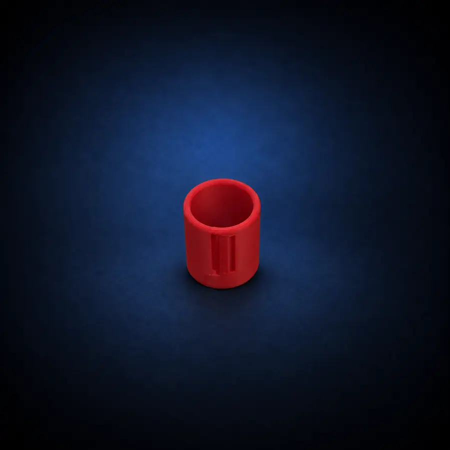 Niimbot Label Applicator 1 Red Niimbot label applicator on a dark navy studio background